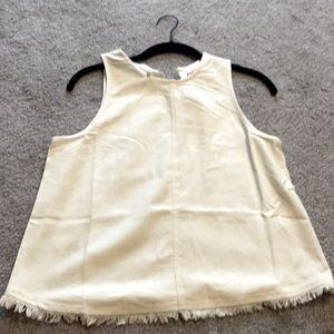 Cream tank top with fringe detail. New with tags!